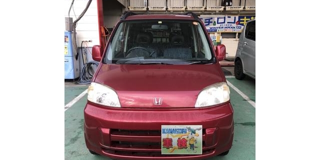 愛知県江南市のお客様から車検整備を依頼されたホンダ ライフ ダンク。工場前で撮影した正面からの外観写真
